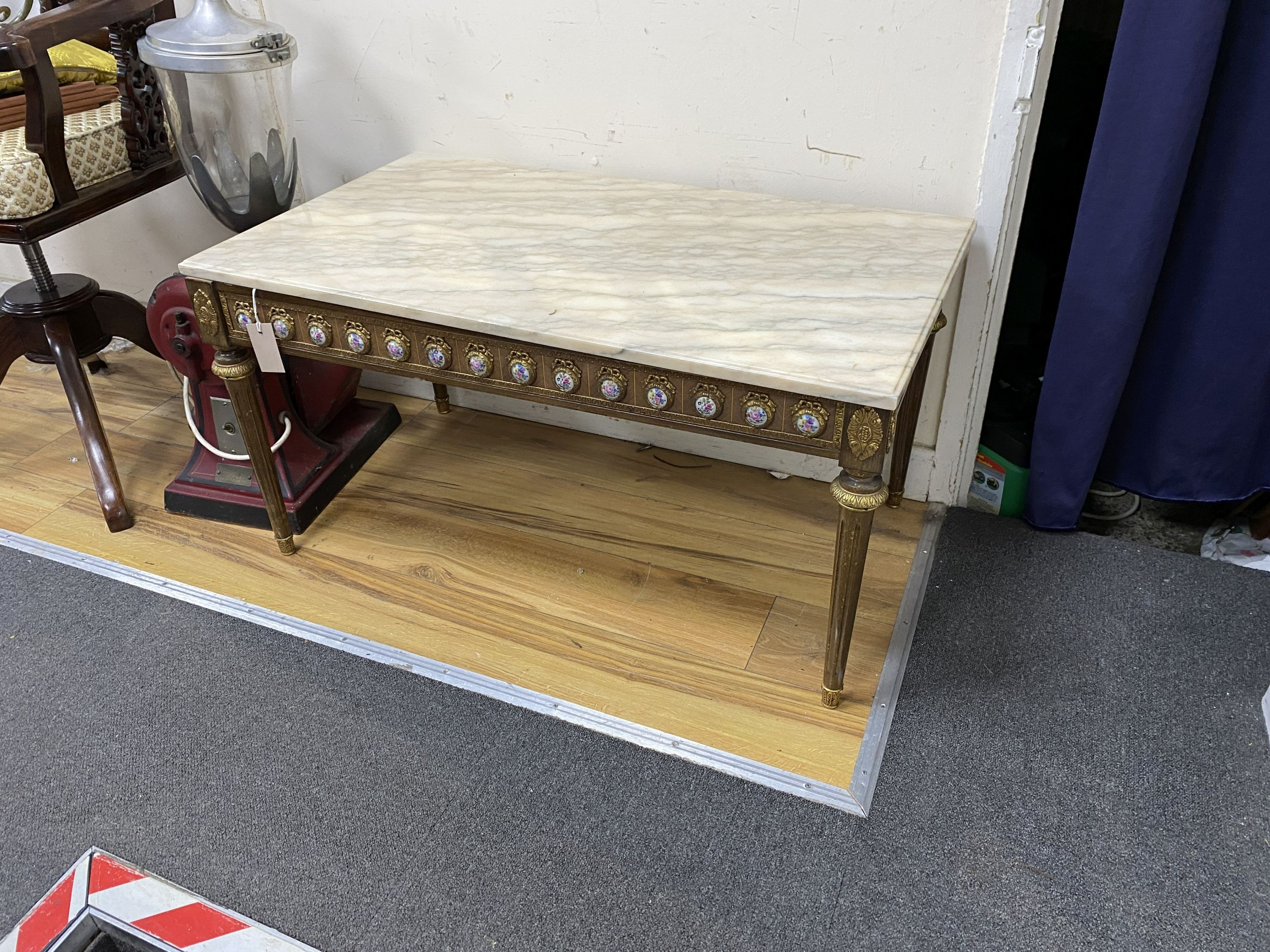 A Louis XVI style rectangular walnut, gilt metal and porcelain mounted mirror, width 60cm, height 90cm together with a similar marble topped coffee table